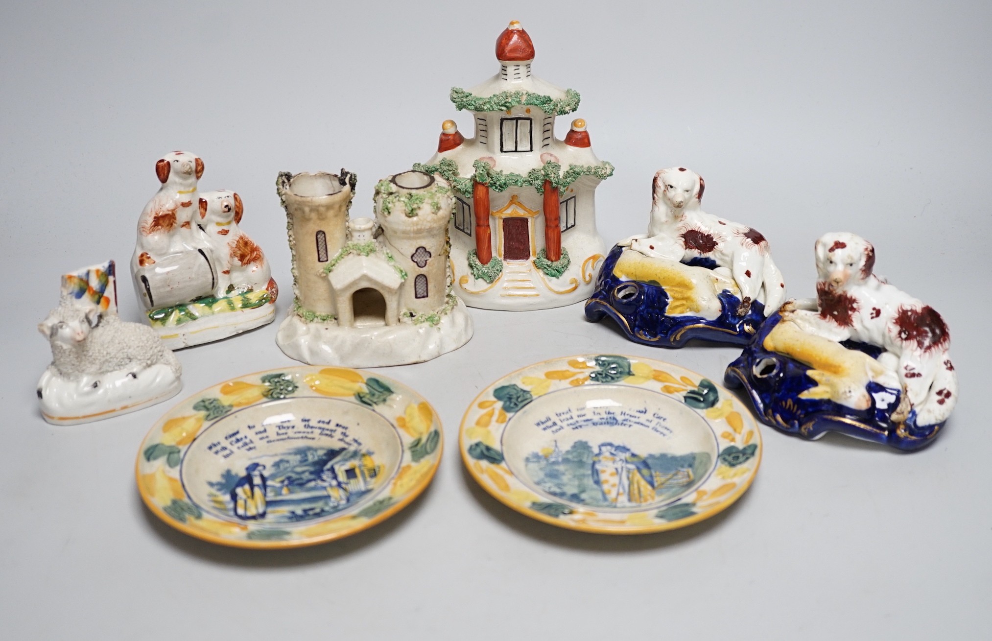 A pair of 19th century Staffordshire King Charles Spaniel pen holders and two pearl ware plates etc (8)